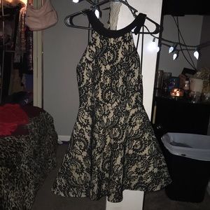Nude and black lace homecoming dress
